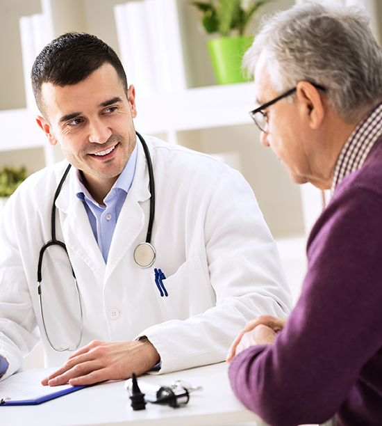 doctor with senior male patient