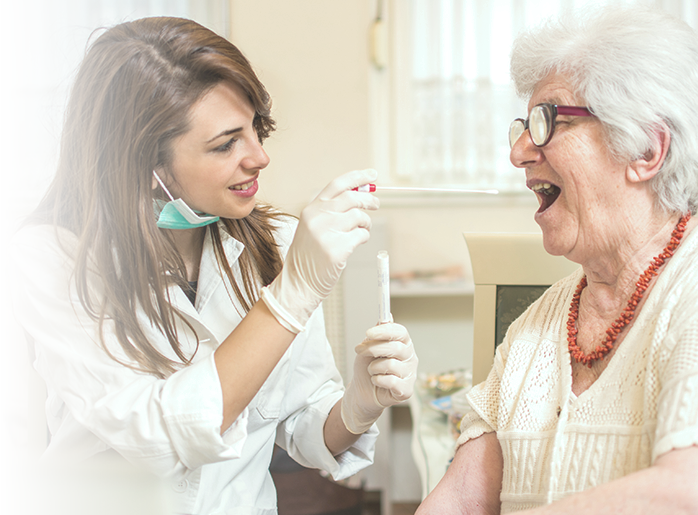 Doctor looking at woman's throat