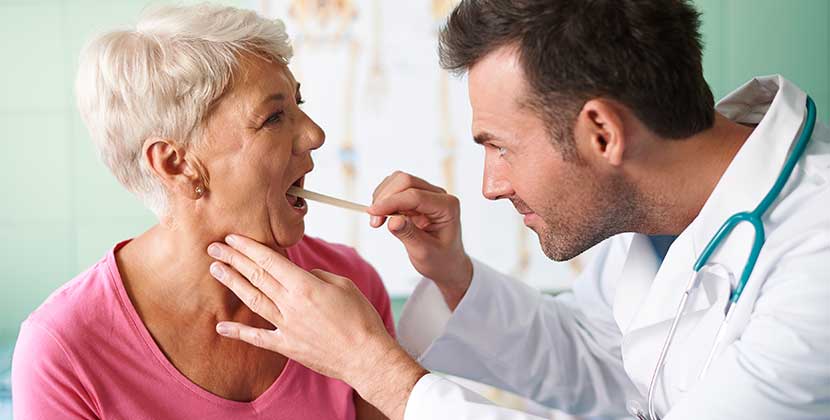 Patient getting mouth checked