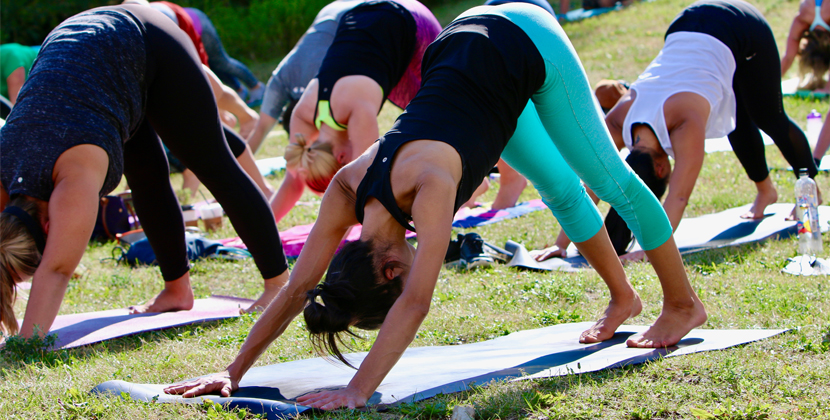 Female doing downward dog Yoga pose