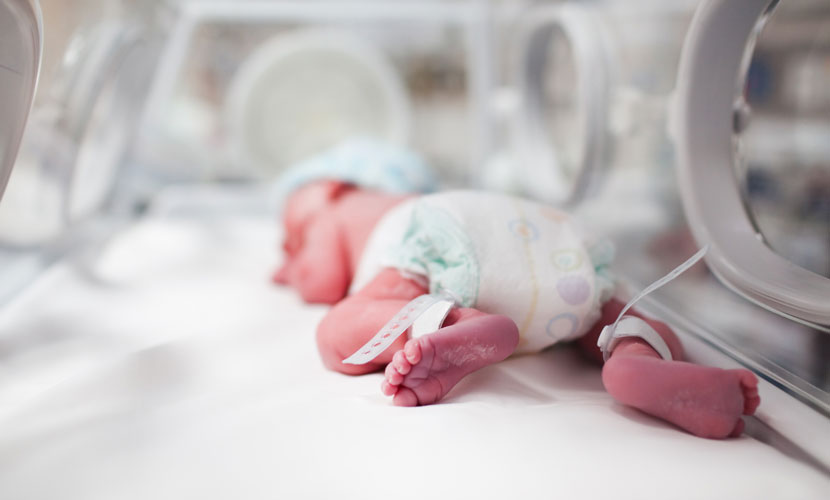 baby in incubator