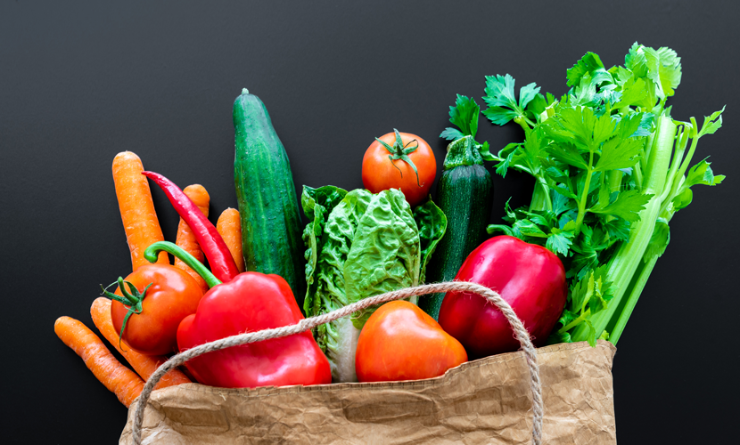 vegetables in brown paper bag