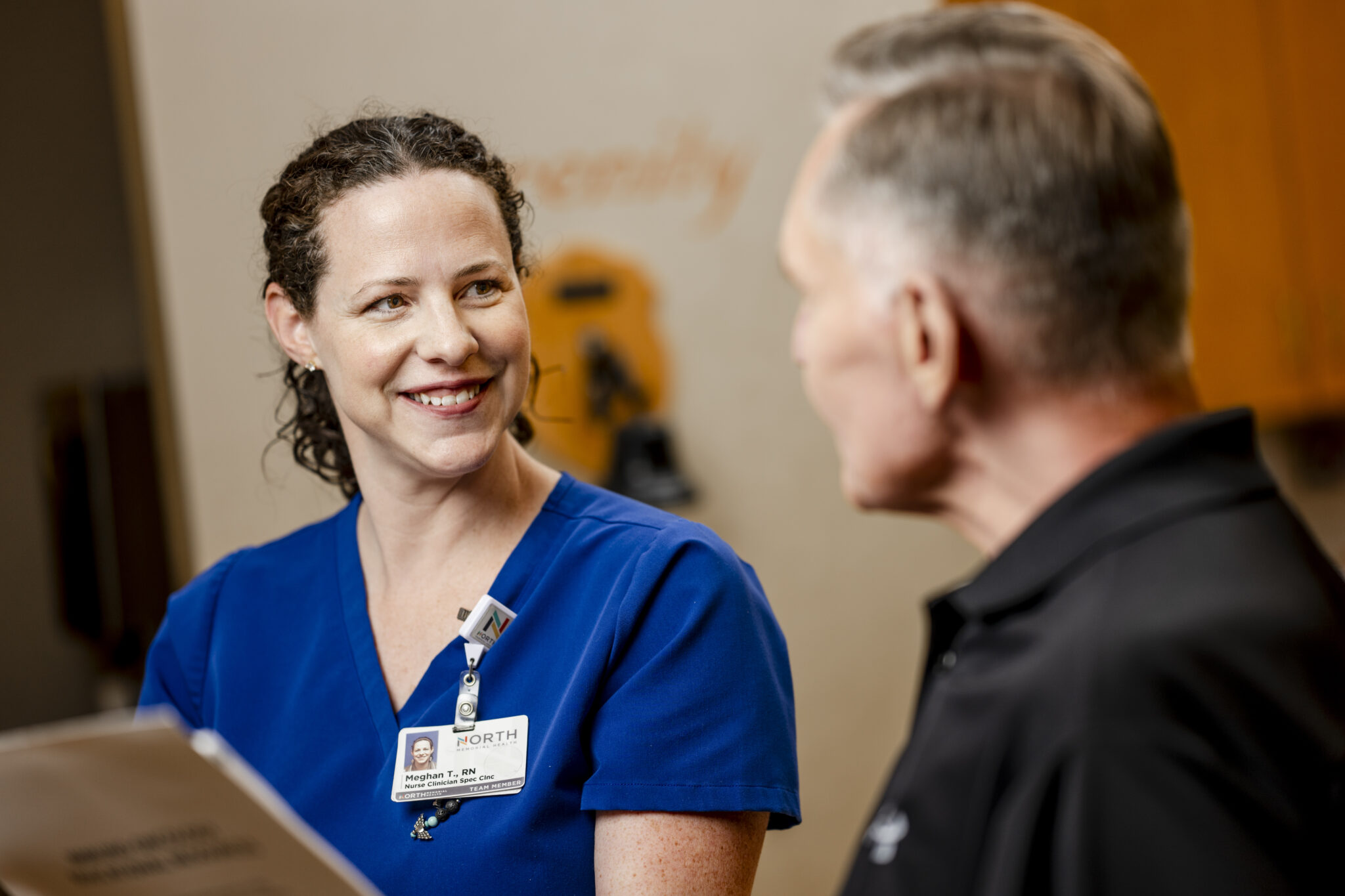 North Memorial Health Cancer Center Nurse with Patient