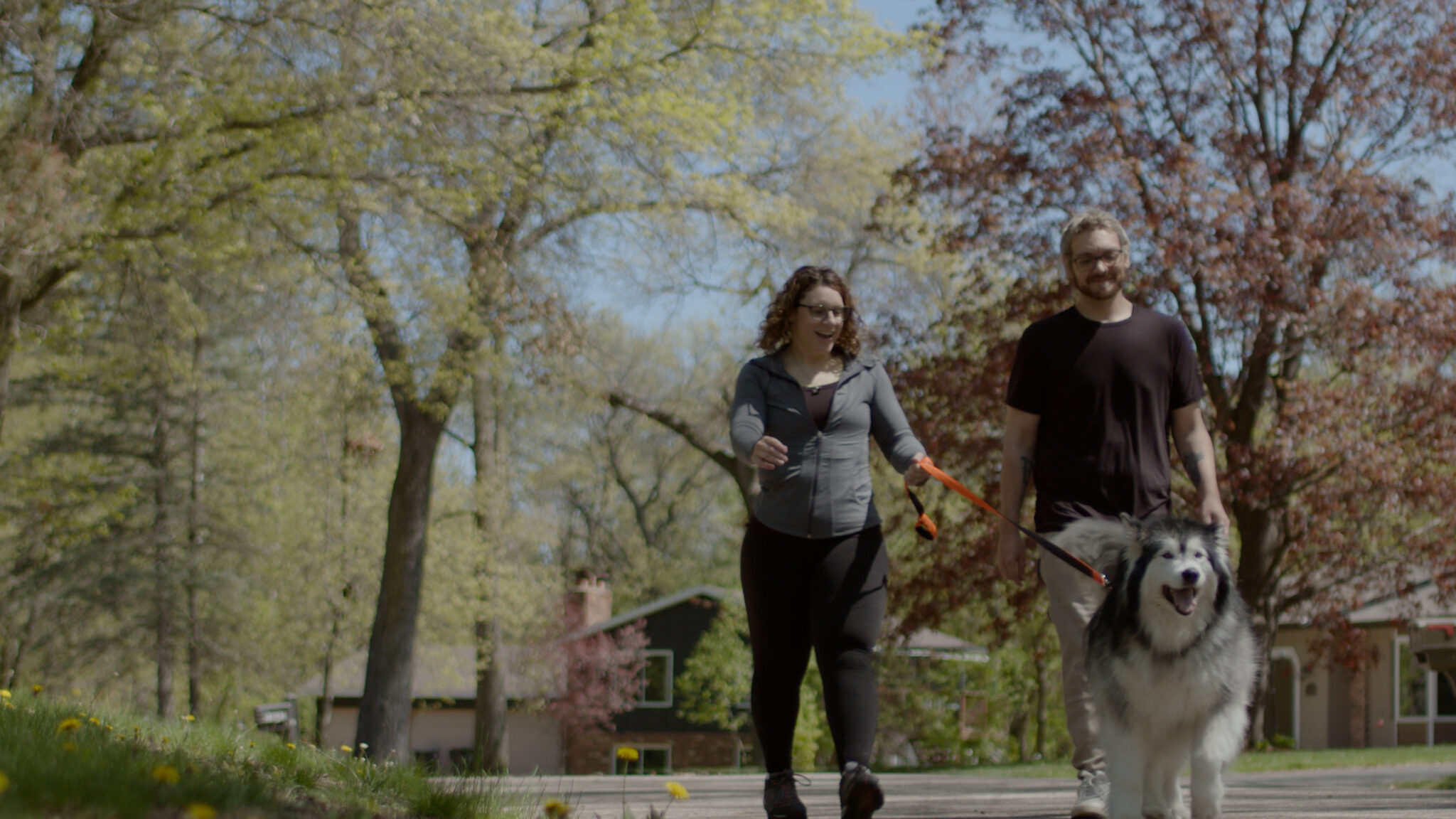 Two North Memorial Health bariatric surgery patients on a walk with their dog